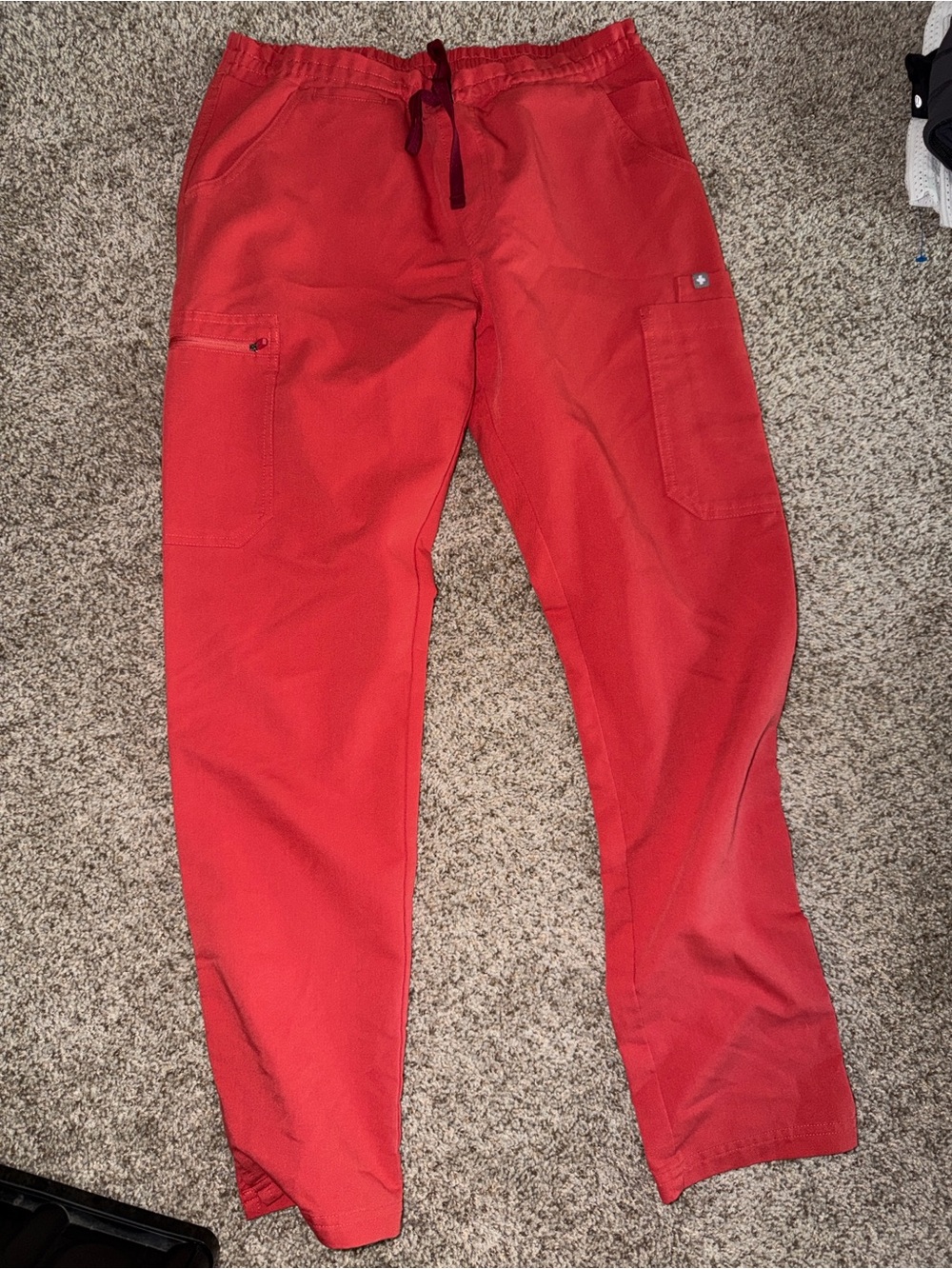 Figs orange scrub bottoms. Size M